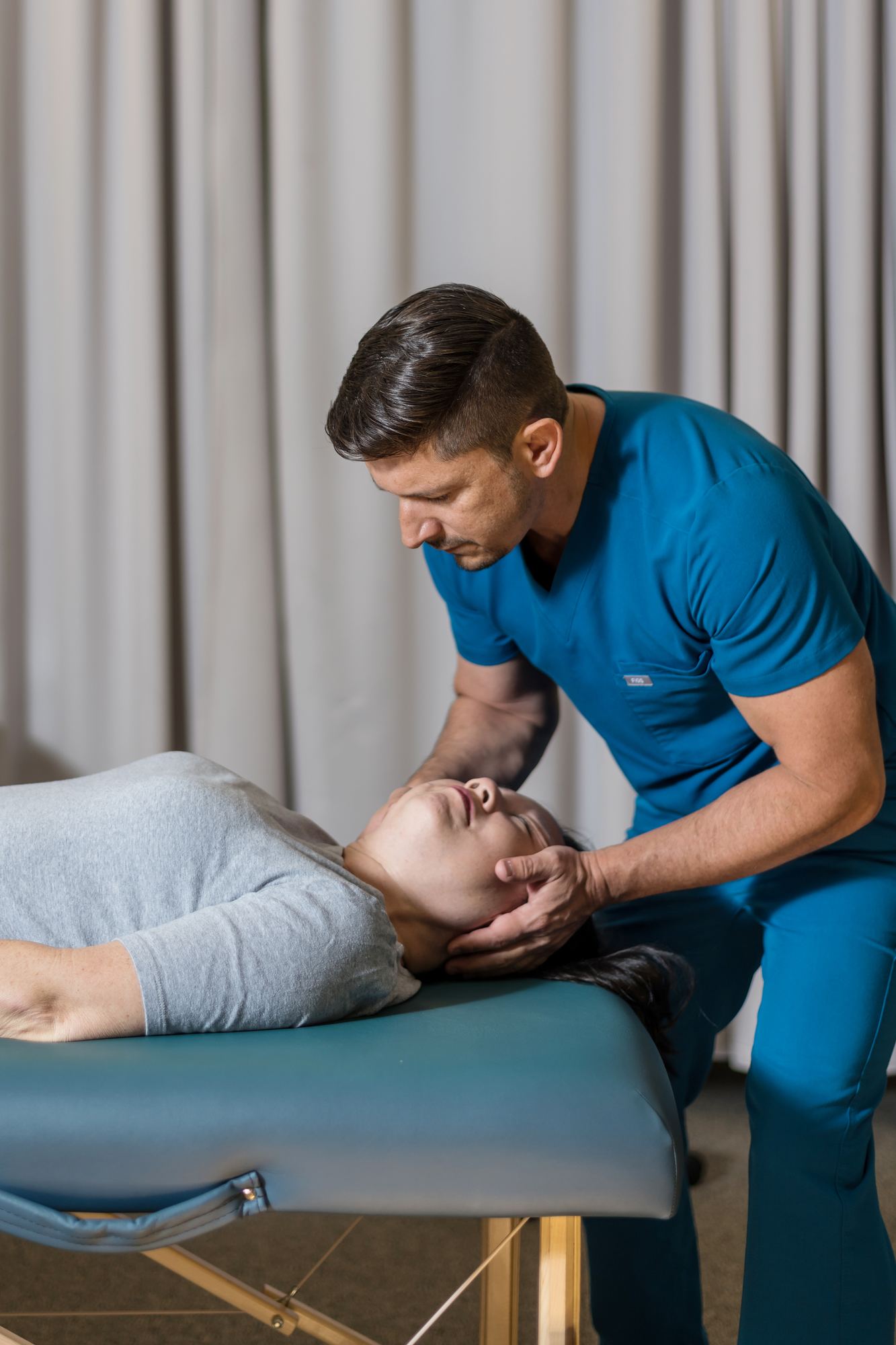 Dr. Thigpen performing a cervical adjustment